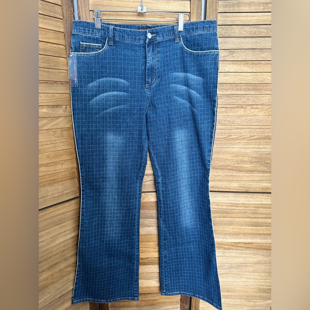 Blue Boot Cut Jeans with silver trim in the sides.. Size 15 super stretchy.